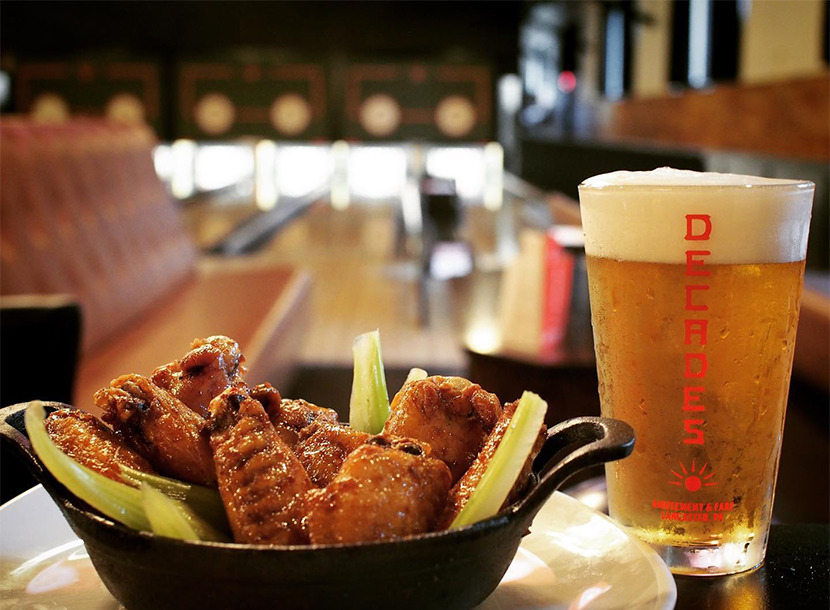 Chicken wings and beer from Decades.